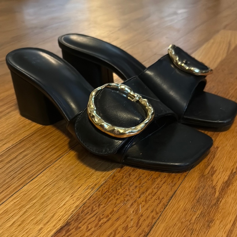 A New Day Black and Gold Mules with Elegant Metallic Details